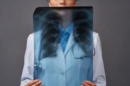 woman-in-white-coat-radiologist-professional-2023-12-14-19-09-03-utc.jpg